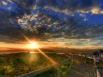 sunset over coastal walkway hdr