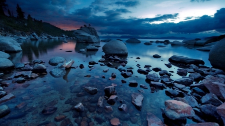 stones strewn on a lake shore  - lake, stones, shore, dusk, rocks