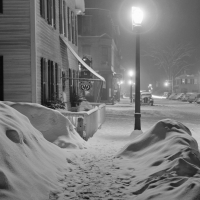 a vintage city street on a winter night