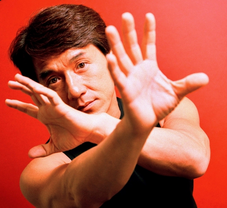 Jackie Chan - hands, pose, background, red