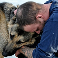 man with pet