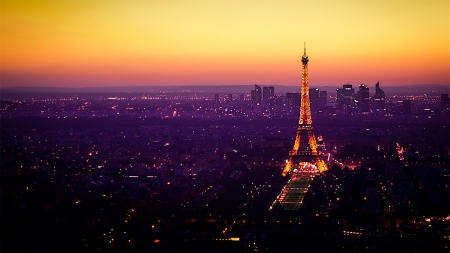 Eiffel Tower - lights, eiffel tower, eiffel, france, tower, bright, light, city, sunset, purple, pink, glow, livingdoll, yellow, dark, sun, set, paris, sun set, orange