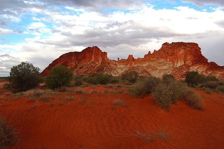 Rainbow Valley, Alice Springs - australia, red desert soil, rock mountains, small shrubs