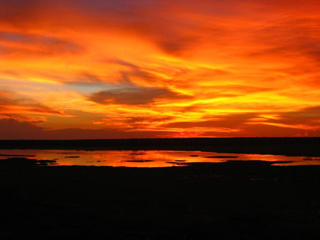 Sunset over Gunbalanya - australia, sunset, orange red clouds