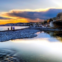 a walk on a beach in a seaside town at sunset hdr