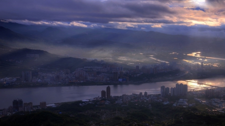 mystical sunbeams over riverside city - clouds, river, sunbeams, city, sky, bridge