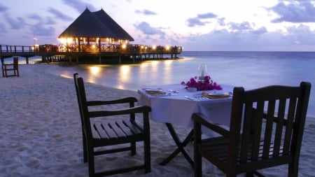 dinner on a beach pier at dusk - beach, table, sea, dusk, pier, restaurant