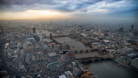 view of a cityscape - river, clouds, city, bridges