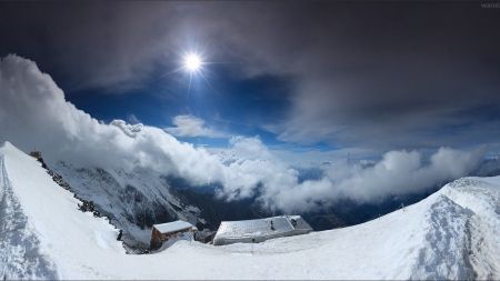 panoramic view of mountain top cabins in winter - sunshine, clouds, panorama, winter, mountains, cabins