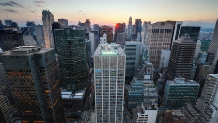 sunset over manhattan skyscrapers