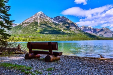 A Peaceful Summer Afternoon - alberta, lake, mountain, bench, gravel, forest, clouds, beautiful, canada