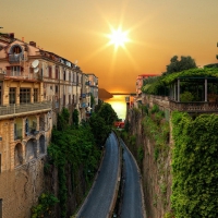 sunset over seaside italian town