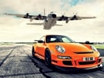 c-130 hercules over porsche 911 gt3 rs