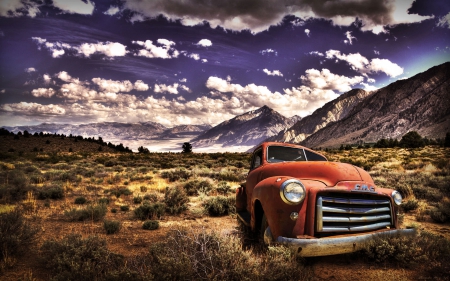 a rusted GMC pickup abandoned in a desert hdr - mountains, pickup, clouds, brushes, desert, hdr, rust