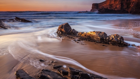 rocks on a beach - beach, cliff, sea, foam, rocks