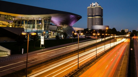 modern buildings along a highway late at night - long exposure, highway, modern, lights, night, buildings