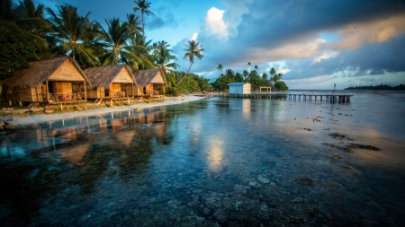 French Polynesia, the Reef - clouds, palms, water, cabins, stones, pier