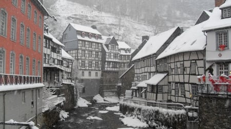 river through an alpine town in snow shower - town, winter, river, mountain, snow