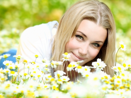 Beautiful girl laying on the daisy flowers field - pretty, blonde, sexy eyes, daisy flowers