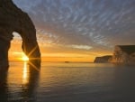 durdle door rock formation in england at sunset