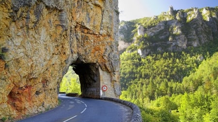 winding road through a rock portal in france - road, chasm, portal, forest, rocks