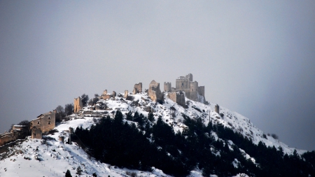 medieval castle ruins on a mountain in italy - village, mountain, ruins, castle, winter, gray