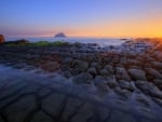 sunrise over fantastic rocky shore hdr