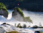 churning falls into a moving river