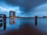 unusual modern building at lakeside in evening