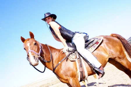 Serious Cowgirl - style, girls, westerns, women, models, hats, ranch, cowgirls, horses, famous, fun, female, boots, fashion