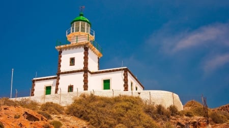 beautiful akrotiri lighthouse on the isle of santorini - sky, lighthouse, wjite, cliff