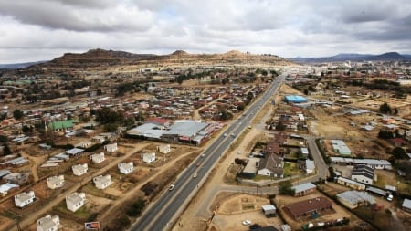 aerial view of museru capital of lesotho - clouds, aerial, highway, desert, view, city