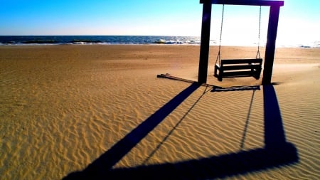 beach swing casts a long shadow - sunshine, beach, swing, bench, sea, shadow