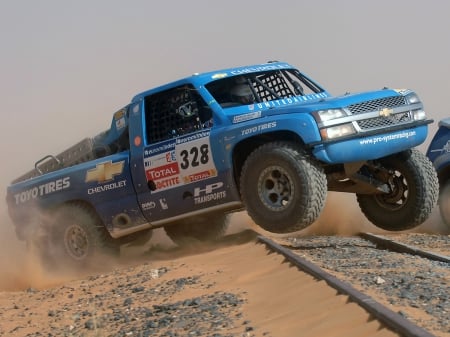 CHEVROLET SILVERADO PICK UP FLYING OVER THE LINES OF THE TRAIN - prime portal, sema show, socal customs, wallpapers up