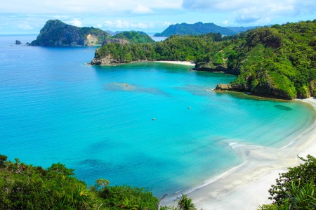 White Sand Beach, Ogasawara Island - clouds, Japan, beach, beautiful, rock, island, forest, turquoise ocean, cliff