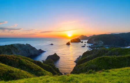 Cape Okulrou Sunset - horizon, islets, sunset, rocks, pacific ocean, japan, beautiful, clouds, grass, coastal, cliffs