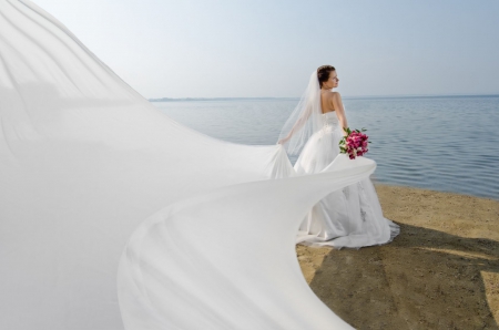 Beautiful Bride - beauty, veil, wedding, ocean, beach, photography, bouquet, bride, beautiful, breeze