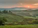 sunset over a tuscan landscape