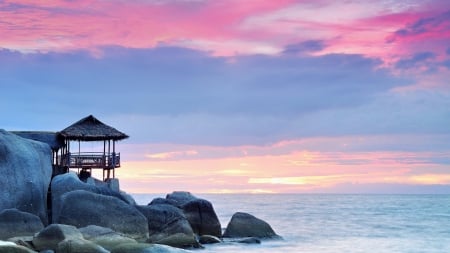 roofed terrace on a rocky shore - shore, sunset, roof, sea, terrace, pink, rocks