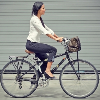 girl on bicycle in North Korea