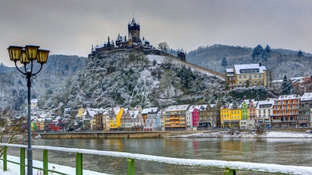 castle on a hill above a river town in winter - hill, river, winter, town, castle