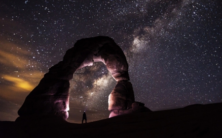 delicate natural arch under starry sky - rock, arch, desert, stars, night, man