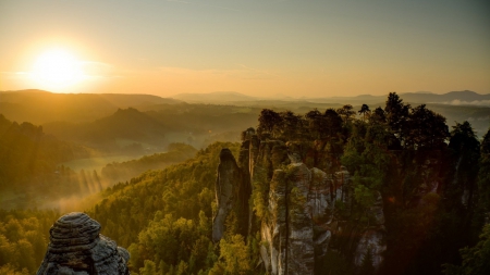 cliff spires in a valley at sunset - trees, sunset, mist, cliffs, spires, valley