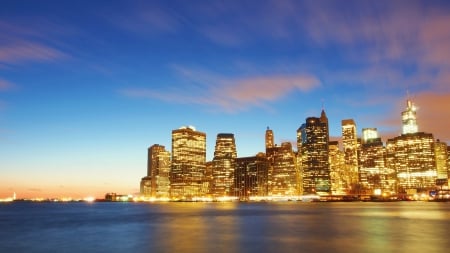 downtown manhattan lit up at dusk - lights, skyscrapers, dusk, city, bay