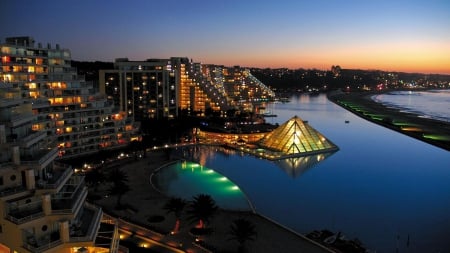 the largest pool in the world at a resort in chile - evening, pyramid, sea, resort, huge, pool