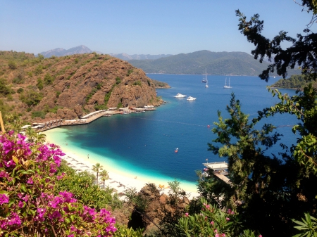 Sailing in paradise - summer, coast, beach, sailboats, flowers, sailing, shore, holiday, view, exotic, beautiful, vacation, sea, travel, resort, lovely, rest, nature, sands, rocks, bay