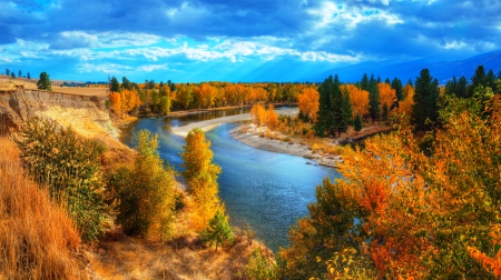 Autumnal River - sunbeams, golden leaves, trees, mountains, forest, yellow, blue, river, beautiful, clouds, orange, green