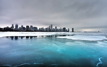 Ice on the Lake - ice, lake, winter, water, cold, skyline, snow, city, frozen