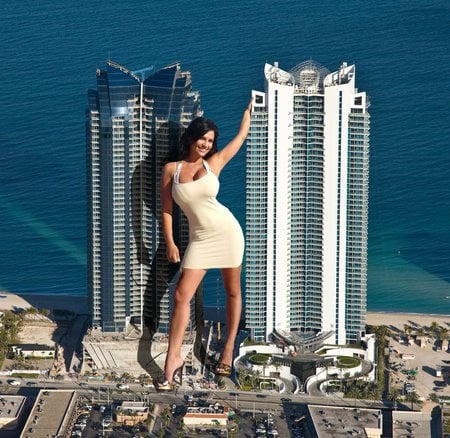 Denise Milani - sea, smile, giant, buildings