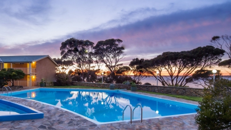 seaside motel pool at sunrise - motel, trees, pool, sea, sunrise